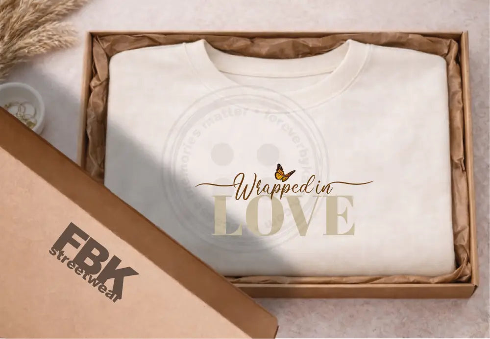 Cotton Sweatshirt - Wrapped in Love logo. Gift wrapped in a box.